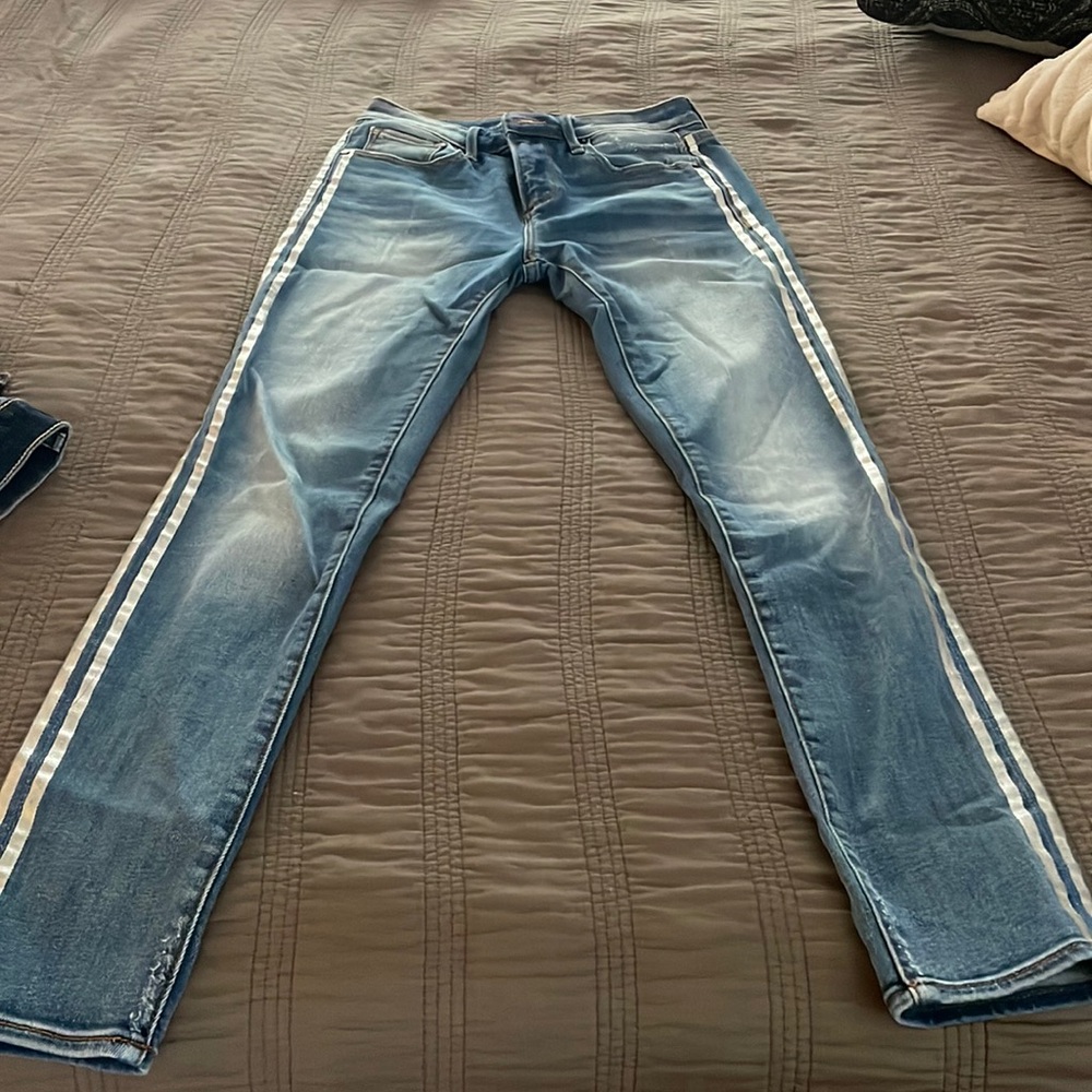 Aqua jeans with silver stripes